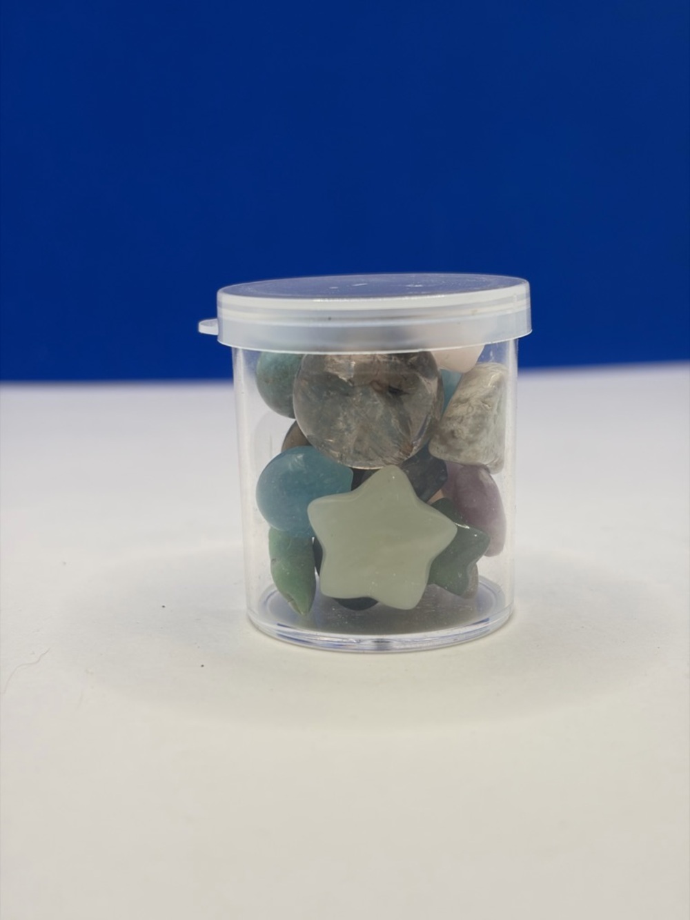 Assorted Polished Crystal Tumbles in 1” Clear Storage Jar - Picture 4 of 5